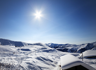 Image showing Ski resort and sky with sun