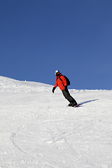 Image showing Snowboarder on ski slope at nice day