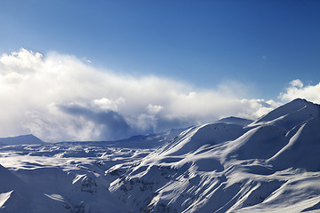 Image showing Evening sunlight mountains in cloud