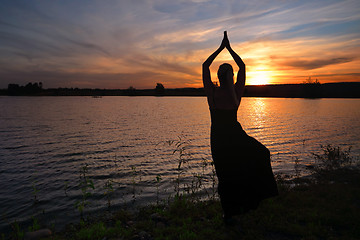 Image showing Sunset meditation Tree Pose