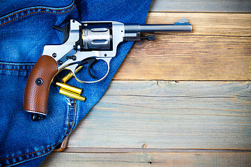 Image showing revolver nagant with cartridges
