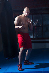 Image showing fighter in red shorts