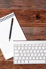 Image showing notebook pen and computer keyboard