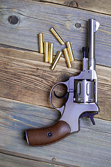 Image showing Vintage revolver nagant with seven cartridges
