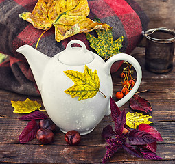 Image showing Autumn still life with kettle