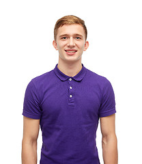 Image showing smiling young man in purple polo t-shirt