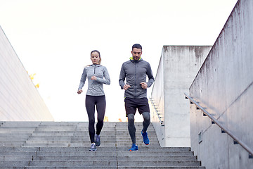 Image showing couple walking downstairs on stadium