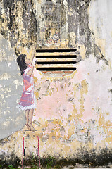 Image showing Girl painted by Ernest Zacharevic in Ipoh.