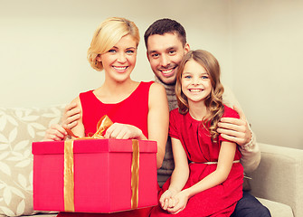 Image showing happy family opening gift box