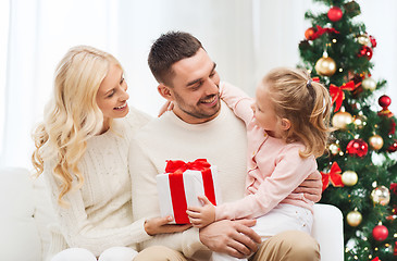 Image showing happy family at home with christmas tree