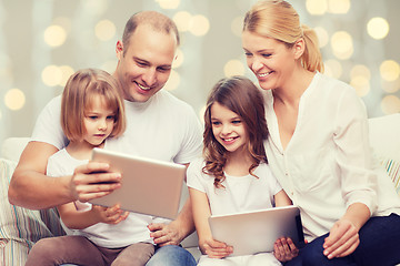 Image showing family and two kids with tablet pc computers