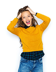 Image showing happy young woman or teen girl in casual clothes