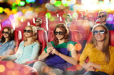 Image showing happy woman with smartphone in 3d movie theater