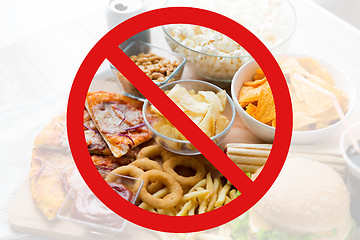 Image showing close up of fast food snacks behind no symbol