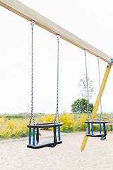 Image showing baby swing on playground outdoors