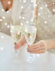 Image showing close up of lesbian couple with champagne glasses