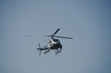 Image showing one helicopter on a blue sky 