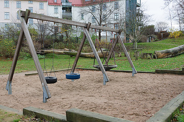 Image showing the playground with three swings hanging