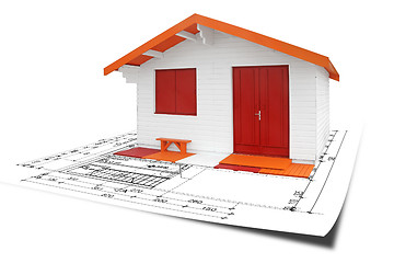 Image showing Wooden assembly House with blueprints