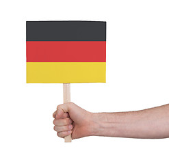 Image showing Hand holding small card - Flag of Germany