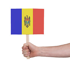 Image showing Hand holding small card - Flag of Moldova