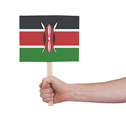 Image showing Hand holding small card - Flag of Kenya