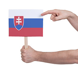 Image showing Hand holding small card - Flag of Slovakia