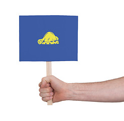 Image showing Hand holding small card - Flag of Oregon