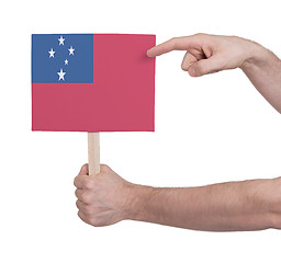 Image showing Hand holding small card - Flag of Samoa