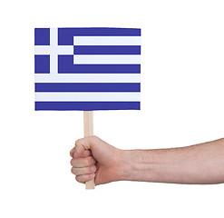 Image showing Hand holding small card - Flag of Greece