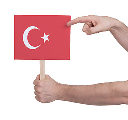 Image showing Hand holding small card - Flag of Turkey