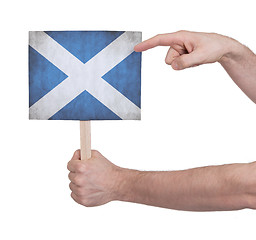 Image showing Hand holding small card - Flag of Scotland