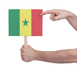 Image showing Hand holding small card - Flag of Senegal