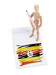 Image showing Wooden mannequin made a drawing - Uganda