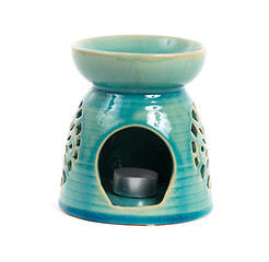 Image showing Candle in oil burner