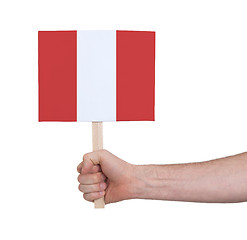 Image showing Hand holding small card - Flag of Peru