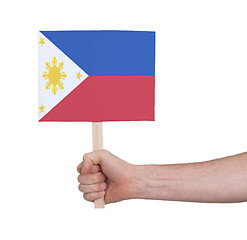 Image showing Hand holding small card - Flag of Philipines