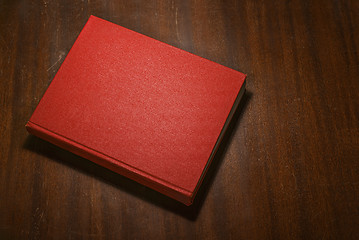 Image showing Red book on the table