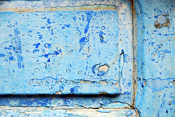 Image showing stripped paint in   wood door and rusty  