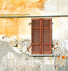 Image showing red window  varano borghi palaces italy   pavement sidewalk