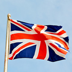 Image showing waving flag in the blue sky british colour and wave