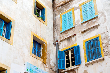 Image showing blue window in  old    brown wall  construction