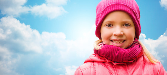 Image showing happy beautiful little girl portrait over blue sky