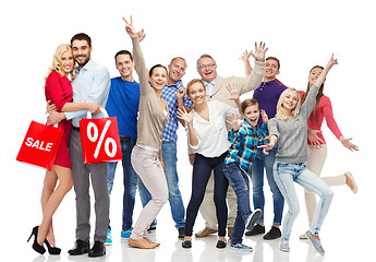 Image showing happy people with shopping bags having fun