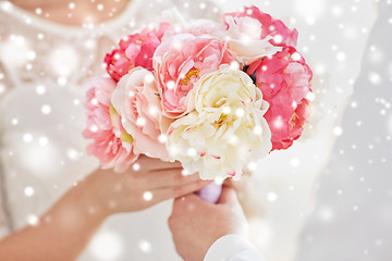 Image showing close up of happy lesbian couple with flowers