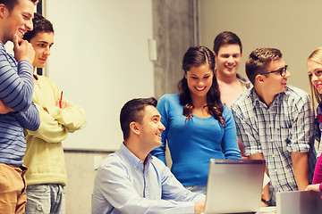 Image showing group of students and teacher with laptop