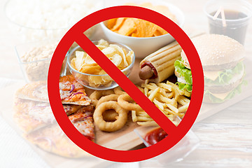 Image showing close up of fast food snacks behind no symbol