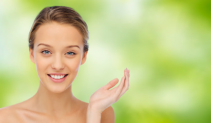 Image showing smiling young woman face and shoulders