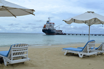 Image showing oil tanker transport ship  pier Picnic Center Beach Corn Island,