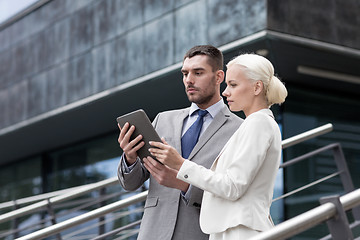 Image showing businesspeople with tablet pc outdoors